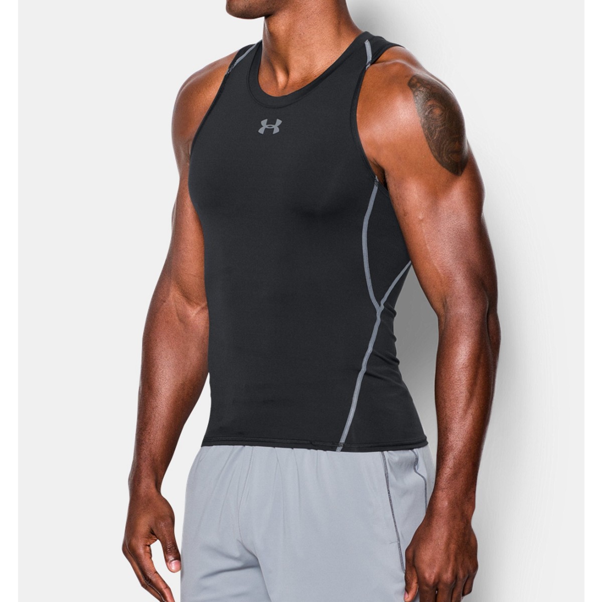 CANOTTA UNDER ARMOUR 1271335 HG ARMOUR TANK NERO MAGLIE UNDER ARMOUR SPORTS  WEAR